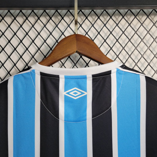 Camisa Grêmio Home 23/24 - Umbro Versão Feminina